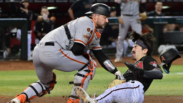 Corbin Carroll scores on a Wilmer Flores double-error
